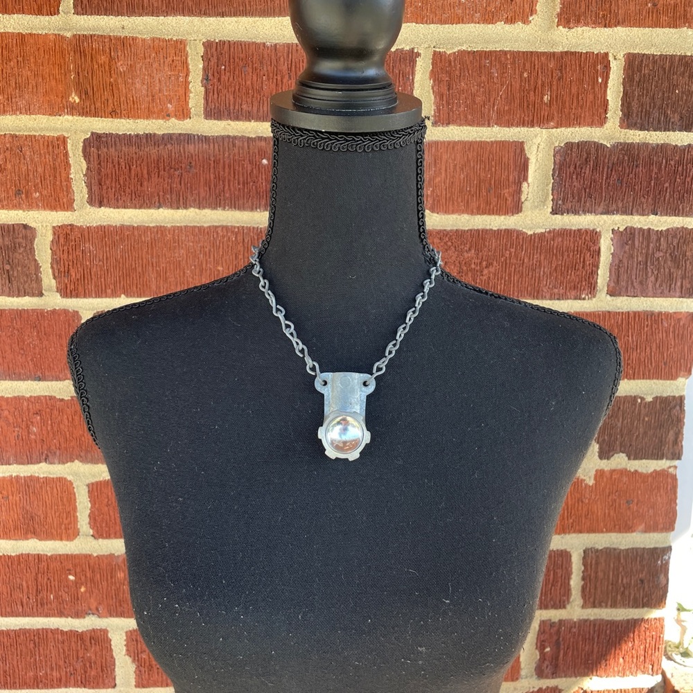 Unique plumbing pendant necklace.